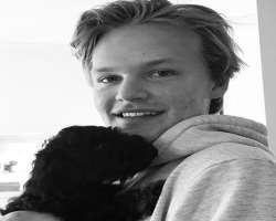 He has adopted a cute puppy in his home.